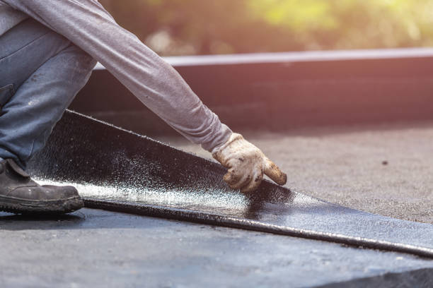 Professional Waterproofing technician working in Jackson Center, OH